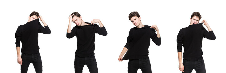 Young male model in black clothes posing in studio white background. Caucasian guy in stylish clothes sweater and jeans isolate. Fashion model young white man