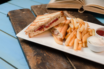 Club-sandwich with french fries