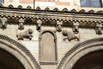 Romanesque lions above the doors to the Basilica of San Cernin in Toulouse