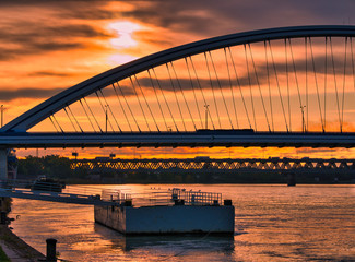 Fototapeta na wymiar Bratislava bridges over Danube river and sunrise, Slovakia