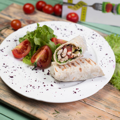 chicken doner with tomato, lettuce , cucumber