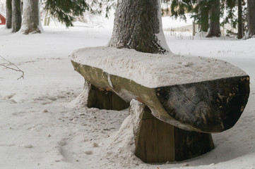 snow-covered bench in Valamo Monastery (Valamon Luostari), Finland