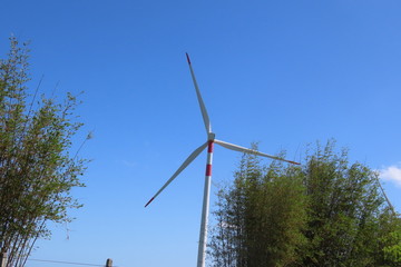 wind turbine against blue sky