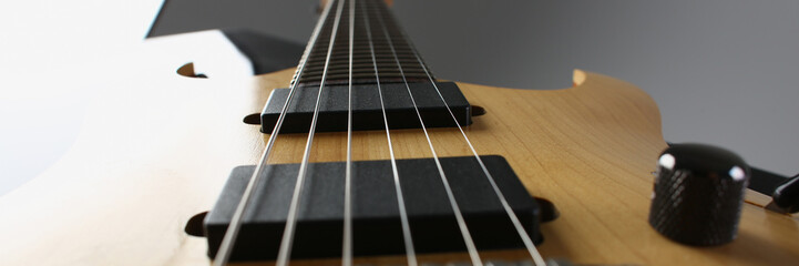 Classic shape wooden electric guitar with rosewood neck