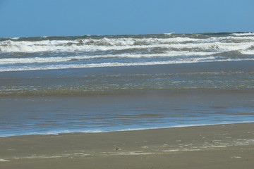 view of beach with sea and blue sky