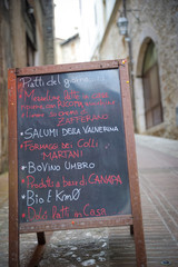 typical dishes of Italian cuisine in a typical Italian village