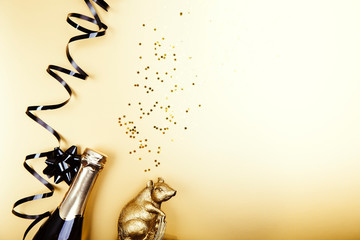 Creative flat lay composition with bottle of champagne