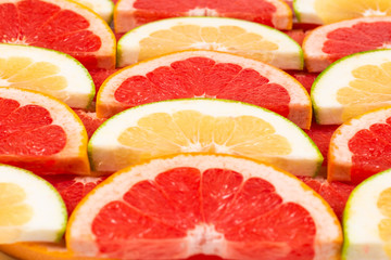 Pomelo and grapefruit slices background.