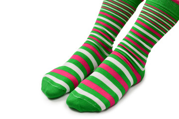Woman in green socks isolated on white background. Top view.
