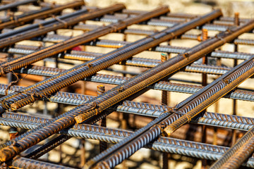 Industrial background. Rebar texture. Rusty rebar for concrete pouring. Steel reinforcement bars....