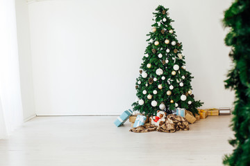 Christmas decor interior of the house Christmas tree with gifts for the new year as a background
