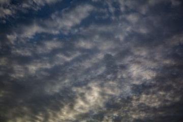 Rows are of dark clouds with hints of light 