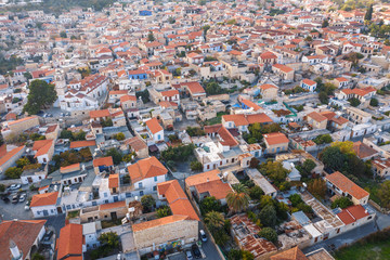 Fototapeta na wymiar Aerial view of Pano Lefkara village in Larnaca district, Cyprus. Famous old village in mountains with orange roofs.