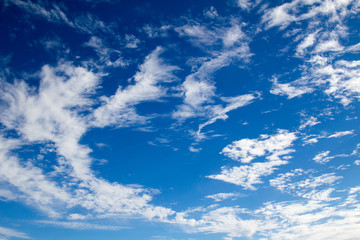 Naklejka na ściany i meble Blue sky with scattered clouds 