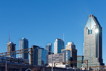 Naklejka premium Montreal downtown with buildings and blue sky