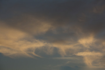 Dark storm clouds with a hint of pink 