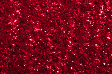 Defocused blurred red  glittery bright shimmering background perfect as a  backdrop. Wonderful...