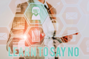 Writing note showing Learn To Say No. Business concept for decline or refuse few things before you destroy yourself Lady front presenting hand blue glow futuristic modern technology