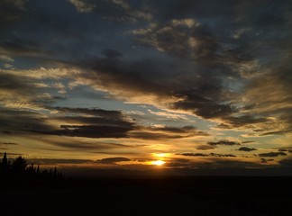 Fototapeta na wymiar sunset ,sun horizon,sky,clouds,multi colored,beauty