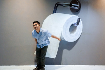 Man with Giant Toilet Paper