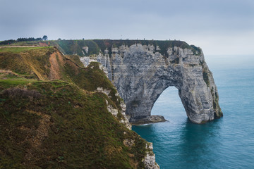 Panoramatic view on Etretat steep rock coastal cliffs at north of France, served as many inspiration for Monet, the impresionist painter