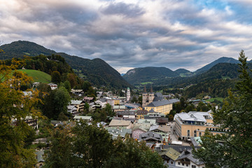 Fototapeta na wymiar Stunning view of Berchtesgaden cityscape on a cloudy day in autumn, Bavaria, Germany
