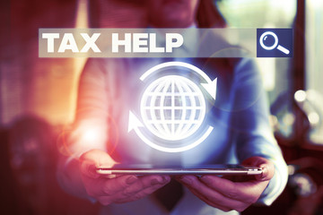 Conceptual hand writing showing Tax Help. Concept meaning Assistance from the compulsory...