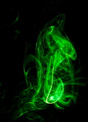 Green smoke on black background