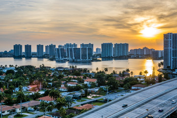 Naklejka na ściany i meble Skyline of South Florida waterfront city at sunset
