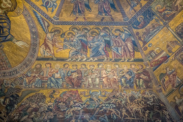 Fototapeta na wymiar Fragment of ceiling mosaic with scenes of the Last judgment in the Florentine Baptistery of San Giovanni. Florence, Tuscany, Italy