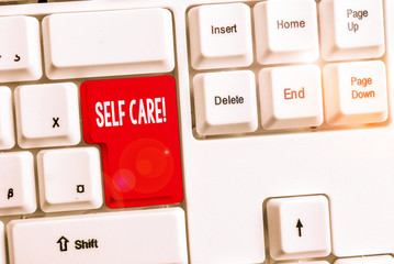 Word writing text Self Care. Business photo showcasing practice of taking action to preserve or improve ones own health White pc keyboard with empty note paper above white background key copy space