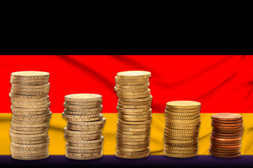 colored national flag of the modern state of Germany on a beautiful silk fabric with an eagle on...