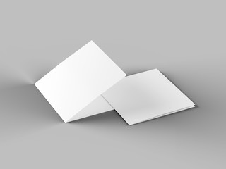 Brochure in square format folded to two - mockup. 3d illustration
