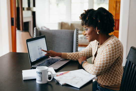 Businesswoman working on laptop