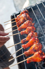 Grilled Chicken Drumsticks for sale on street Koh Lipe Thailand