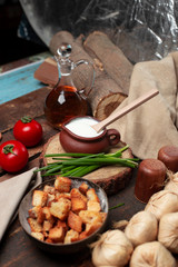 vegetables and salt with wooden background