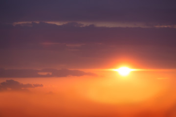 sunset in cloudy sky