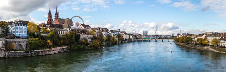 Panorama look at boardwalk in Basel - city near Switzerland, Germany and France, included cathedrals two towers and russian wheel