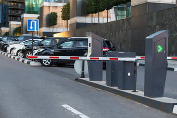 Cars in the Parking closed by a Barrier