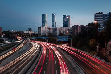 Obraz na płótnie Canvas Highway and Madrid's four towers, Spain.