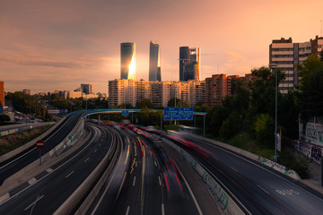Obraz na płótnie Canvas Highway and Madrid's four towers, Spain.