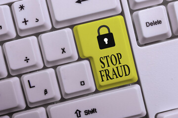 Text sign showing Stop Fraud. Business photo text campaign advices showing to watch out thier money transactions White pc keyboard with empty note paper above white background key copy space