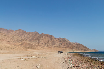The coastline of the Red Sea and the mountains in the background. Egypt, the Sinai Peninsula.