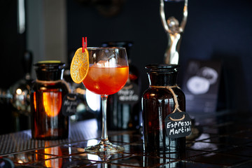 Venetian spritz cocktail in the interior of a bar or restaurant. Close-up.