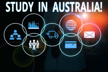 Text sign showing Study In Australia. Business photo text going into foreign country order complete your studies Woman wear formal work suit presenting presentation using smart device