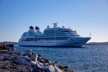 Fototapeta na wymiar Passenger ships arrives Brønnøysund port in Nordland county
