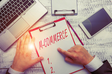 Word writing text M Commerce. Business photo showcasing commercial transactions conducted electronically by mobile phone