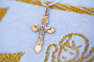 Orthodox gold cross and baptismal shirt