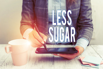 Writing note showing Less Sugar. Business concept for Lower volume of sweetness in any food or...