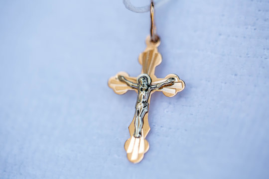 Orthodox gold cross and baptismal shirt